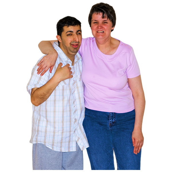 A man with learning disabilities next to a woman who has her arm around his shoulders