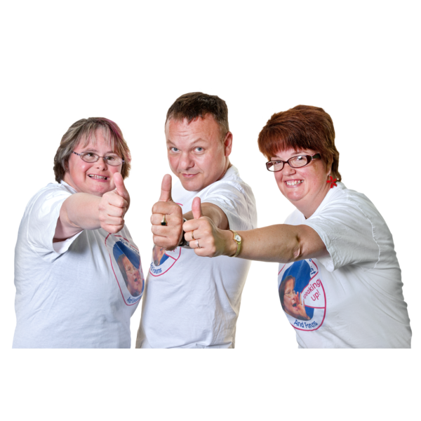 A group of 3 people in white T-shirts smiling with their thumbs up