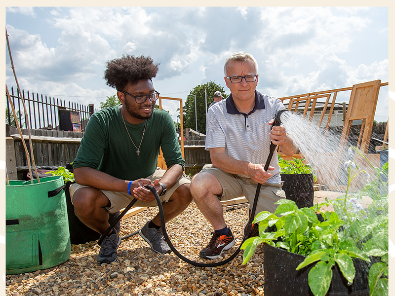 Two men gardening