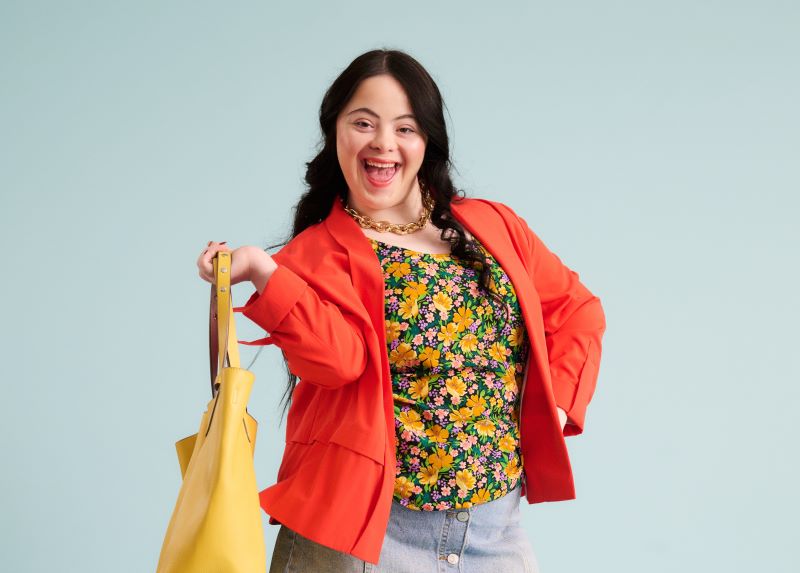Ellie modelling Mencap shop clothing for LD Week