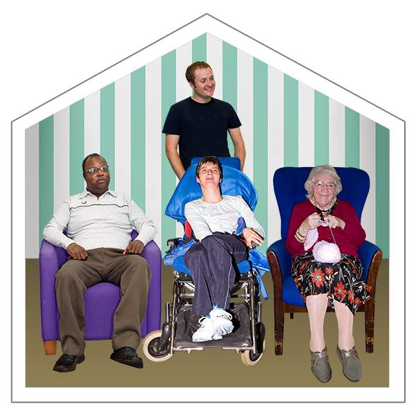 Three people sitting in a house and a care worker looking after them
