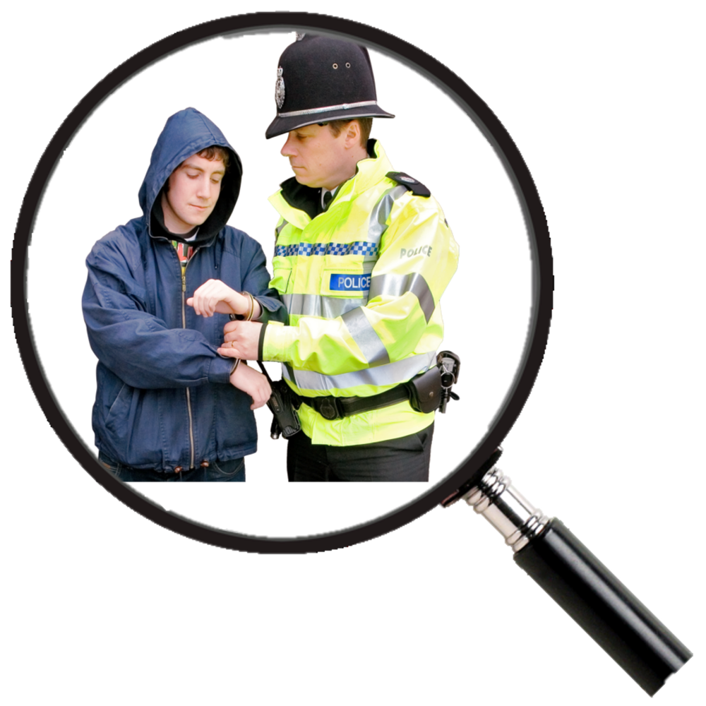 A magnifying glass over the picture of a man being handcuffed by a policeman
