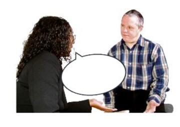 A woman talking to a man