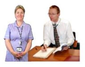A nurse standing next to a doctor at a desk