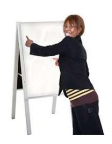 a teacher at a flipchart
