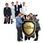 a team of people around a shield which says Safe Guarding