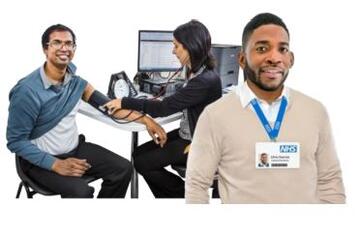 A doctor standing in front of another doctor who is taking a patients blood pressure