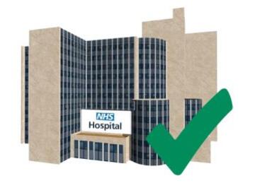 a hospital with a green tick next to it