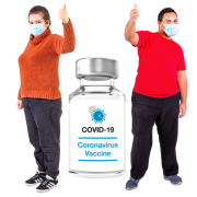 Two people with one of their hands raised standing between a bottle of the Covid vaccine 