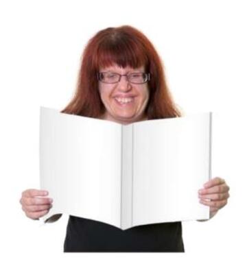 A woman reading and smiling
