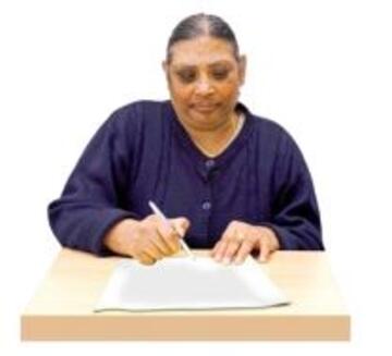 A woman writing a letter