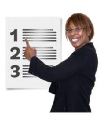 A woman pointing to a list on a wall