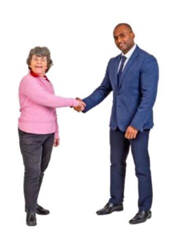 A man shaking hands with a woman