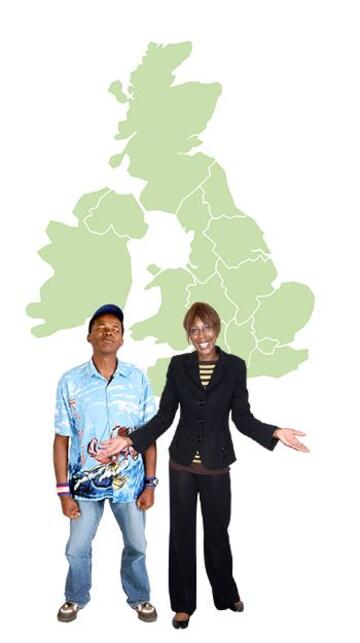 A black man and woman stand in front of a green map of the United Kingdom