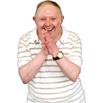 A man with his hands together smiling in excitement