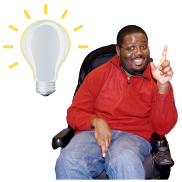 A man in a wheelchair smiling with a finger pointed in the air and a light bulb symbol next to him