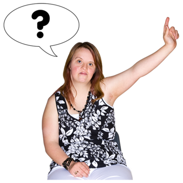 A woman with her hand in the air to ask a question