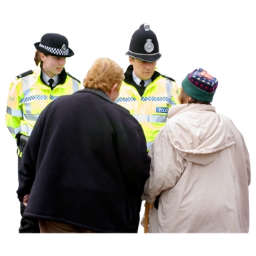Two people talking to two members of the police