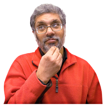 A man in a red jumper thinking