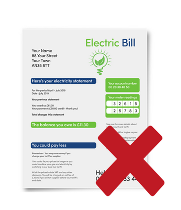 An electricity bill with a red cross beside it.