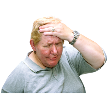 A woman in pain with her hand on her head.