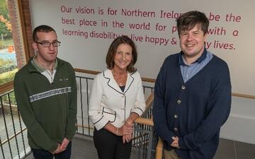 A photograph of the Chair, Vice Chair and Chair of Trustees