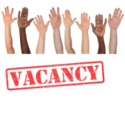 A picture of a lot of raise hands above a Vacancy sign