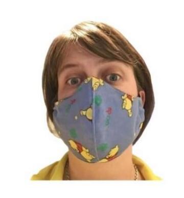 A woman wearing a face covering