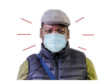 A man feeling warm when wearing a face covering
