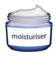 An open tub of moisturising cream