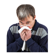 A man blowing his nose in a tissue