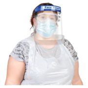 A woman wearing a face covering and a clear visor which goes over her whole face.