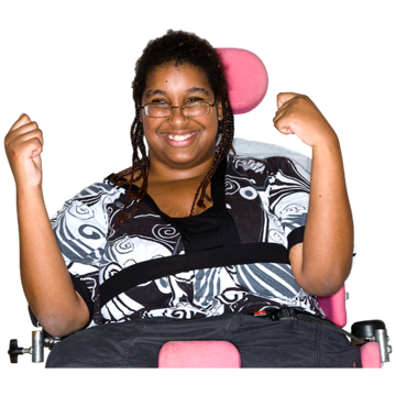 A lady in a wheelchair smiling.