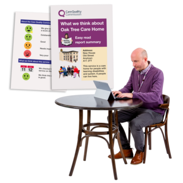 A man using a laptop to download a report