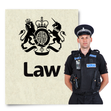 A policeman standing next to a book with the title; Law