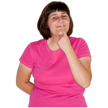 A woman with her finger on her lips thinking