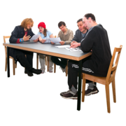 A group of people around a meeting table