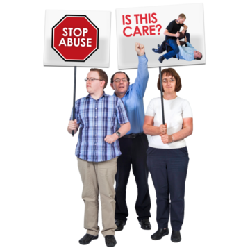 Protesters holding up signs saying "Stop abuse" and "Is this Care?"