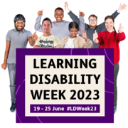 A group of people waving and holding thumbs up, smiling and facing the camera. In front of them a sign reads Learning Disability Week 2023 19 - 25 June #LDWeek23