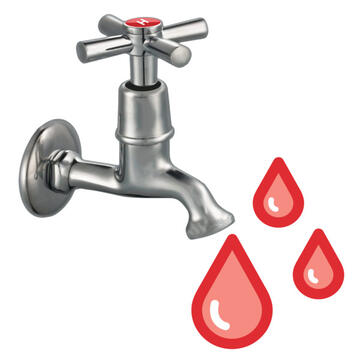 A tap with hot water coming from it.
