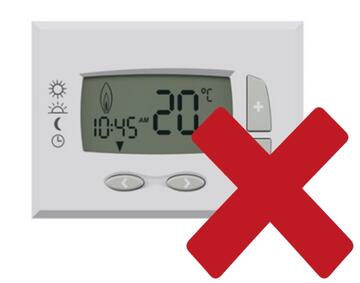 A thermostat with a red cross beside it.