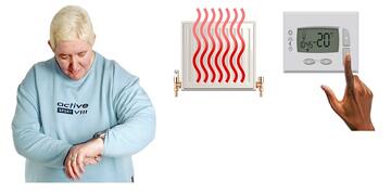 A woman looking at her watch.  Behind her is a radiator and a room thermostat.