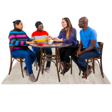 A meeting of people around a table