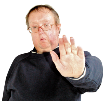 A man holding his hand up to say no