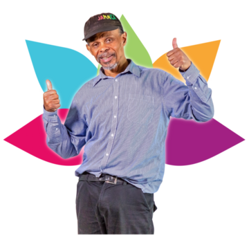 A man looking happy and healthy with his thumbs up