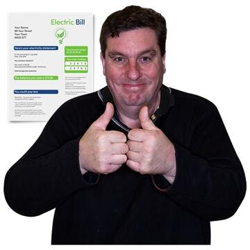 A man smiling with his thumbs up with an electric bill behind him.