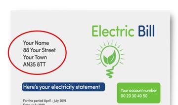 An electric bill with a red circle around a name and address.