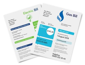 An electricity bill and a gas bill.