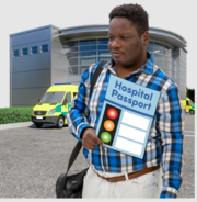 A man outside a hospital carrying his hospital passport