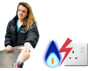 A lady paying some money.  Beside her is a gas flame and an electric socket.